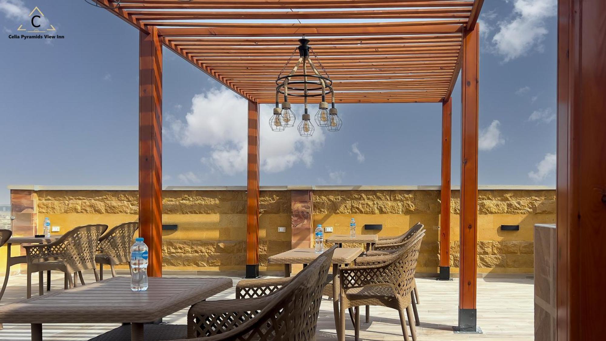 Celia Pyramids View Inn Nazlet el-Sîsi Kültér fotó